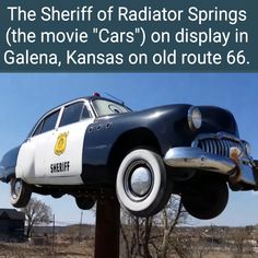 the sheriff of radiator springs movie cars on display in galana, kansas on old route 66