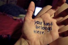 a person holding their hand up with the words your hand belongs here written on it