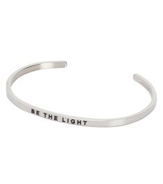 Wear the Mantraband Be the Light Bracelet as your reminder to shine the light that is within you. Be kind, choose joy, give love. Be the light in your own life, and in the life of others. Features Delicate but durable, made to last a lifetime Fully adjustable, one size fits most Details Materials: Stainless steel. Lead free, nickel free, hypoallergenic, tarnish resistant. Gold & rose gold Care: To clean, wipe with a soft cloth. Avoid frequent contact with strong chemicals, such as detergent, bleach, perfume, etc. Country of Origin: Imported Light Bracelet, Mantra Bands, Give Love, Shine The Light, Be The Light, The Lives Of Others, Choose Joy, To Shine, Be Kind