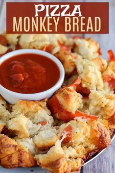 the homemade pizza monkey bread is ready to be eaten with sauce on top and in the middle