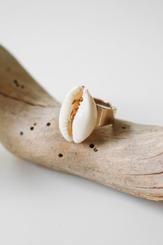 Gold ring with shell pendant. All Lauren Nicole jewelry is nickel compliant. This item is Final Sale.