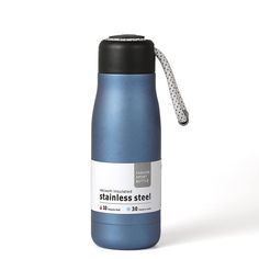 a blue stainless steel water bottle with a black lid and white label on the side