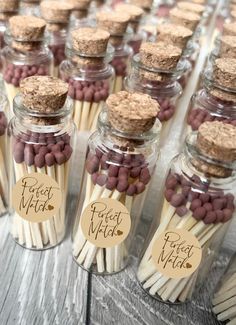 small glass jars filled with matches and stickers