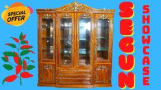 a wooden display cabinet with glass doors and ornate carvings on the front, along with special offer stickers