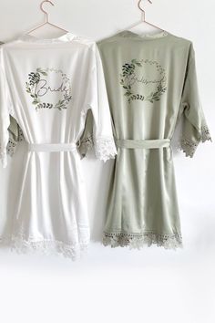 three robes hanging on a wall next to each other with the word bride written on them