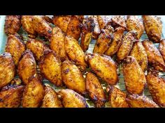 chicken wings on a cooling rack ready to be cooked