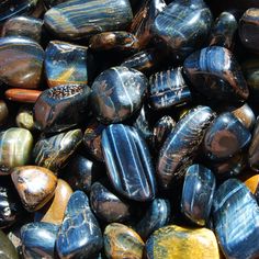 Natural blue Tiger's Eye tumbled stones from Brazil. These medium sized pieces measure approximately .75 to 1.25 inches.Tiger's Eye is a stone of Confidence. Promotes energy flow through the body when worn or carried. Lends confidence, strengthens convictions. Protects against all forms of danger. Increases psychic awareness. Stimulates wealth.Chakra: Solar Plexus ❤︎ Follow us on Instagram to keep updated on sales and have first dibs on new products @CasparCuriosities ❤︎ Crystal Girl, Chakra Solar Plexus, Tiger's Eye Crystal, Rain And Thunder, Stone World, Tiger Eye Crystal, Blue Tigers