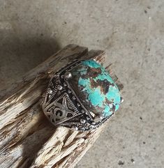 WANTED all over the Universe. Turquoise is recognized Sought After by early KINGS, MOVERS, and SHAKERS! Turquoise is said to be a vessel Imbued with energies associated with Heaven! All My Turquoise is Carefully chosen from around the World. I love the Raw Authentic look and feel of the stone...so I do not over polish the Turquoise! True Bohemian Style...an Original work of Art that you can treasure for a lifetime! Each of My Creations are One of A Kind and are Hand wrought to bring out the best Western Style Gemstone Ring, Western Style Gemstone Ring Jewelry, Handmade Southwestern Style Ring Jewelry, Handmade Southwestern Style Ring, Oval Bohemian Collectible Jewelry, Western Style Turquoise Gemstone Rings, Bohemian Adjustable Untreated Jewelry, Adjustable Western Gemstone Rings, Adjustable Western Style Gemstone Rings