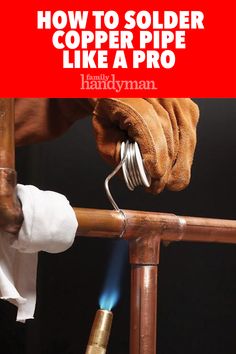 a hand holding a pipe that is connected to a piece of wood with the words how to solder copper like a pro