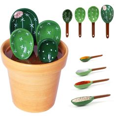 green ceramic utensils and spoons in a pot