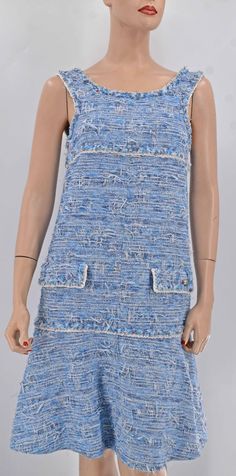 Chanel fantasy tweed dress with Chanel interlocking CC logo emblem. Color is beautiful blend of light blue and white. It retails $6200 before tax. Chanel Shorts, Fringed Dress, Vintage Mini Dresses, Church Dress, Chanel Tweed, Logo Emblem, Church Dresses, Fringe Dress, Dress Spring