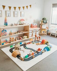 a child's play room with toys on the floor