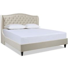 a bed with white sheets and buttons on it's headboard, in front of a white background