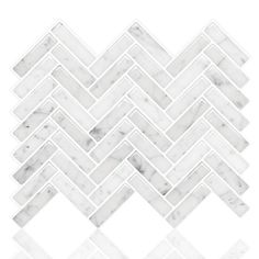 a white marble herringle tile pattern