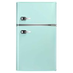 a mint green refrigerator freezer sitting on top of a white counter next to a wall