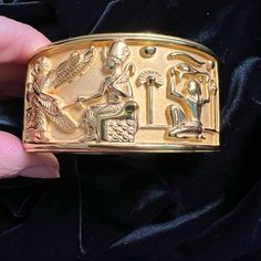 Elizabeth Taylor Hinged Bracelet Egyptian Revival Signed See Photos For Measurements Size Large 1993 Light Scratches On The Sides/Edges Egyptian Detail Seems To Be In Excellent Shape Please See Photos As It Is Also Part Of The Description J11 Avon Jewelry Vintage, Egyptian Bracelet, Large Bracelet, Egyptian Revival, Avon Jewelry, Hinged Bracelet, Elizabeth Taylor, Jewelry Vintage, Womens Jewelry Bracelets