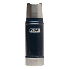 stainless steel thermos bottle with blue lid and silver cap, standing upright on a white background