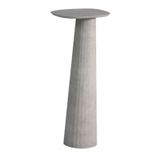 a tall concrete pedestal on a white background