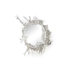 a circular mirror that is made out of silver foil