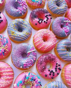 a bunch of doughnuts with sprinkles are on the twitter page