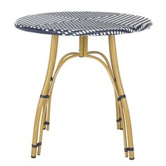 a round table with bamboo legs and a black and white checkered top on an isolated white background