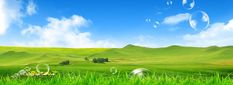 a green field with grass and bubbles floating in the air above it is a blue sky filled with white clouds