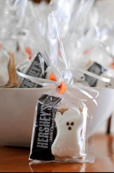 halloween treats are wrapped in cellophane to look like ghost cookies and marshmallows