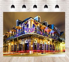 an image of a building with lights on it's front and the words mardi gras written in large letters