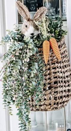 a basket filled with carrots sitting on top of a table