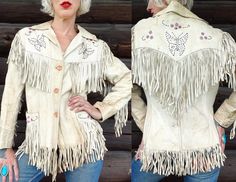 "1940s Butterfly Beaded White Leather Fringe Western Jacket Fully lined, with soft pink Deco buttons.  White leather shows the perfect amount of wear and character. Jacket fits like a womens small.  Measurements  shoulders: 17\" chest: 38\" sleeve: 21\" length: 27\"" Fitted Vintage Outerwear For Festival, Vintage Hand-stitched Outerwear For Fall, White Fringe Jacket, Western Leather Jacket With Fringe For Winter, White Fringe Leather Jacket, Vintage Leather Jacket With Fringe For Winter, Fitted Vintage Outerwear With Fringe, White Leather Jacket, Jacket Fits