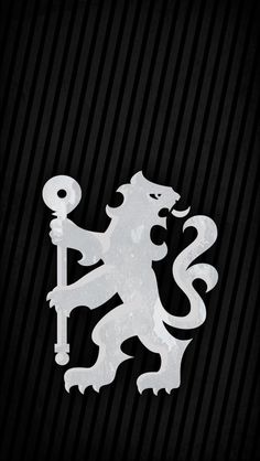 a blue and white sign with a lion holding a key in it's mouth