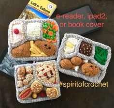 three crocheted trays with food in them on a table next to a book