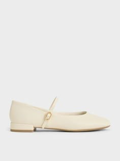 Chalk Round-Toe Mary Janes | CHARLES & KEITH Luxury White Round Toe Ballet Flats, Church’s White Shoes, Luxury Mary Jane Closed Toe Flats, Luxury Elegant Mary Janes For Spring, Elegant Flat Shoes White, Luxury Classic Mary Janes With Almond Toe, Luxury Mary Jane Ankle Strap Flats, Luxury Chic Almond Toe Mary Janes, Luxury White Mary Janes For Women