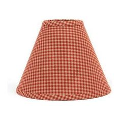 a red and white gingham lampshade on a white background, with the bottom