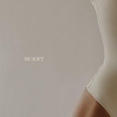 a woman in a white bodysuit with the words besot on it