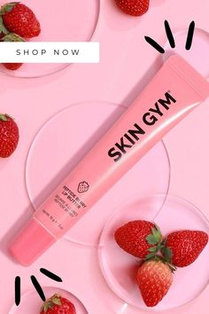 Flat lay of a lip butter with a few strawberries around with text overlay Shop Now. Skin Care Essentials, Face Skin, Good Skin