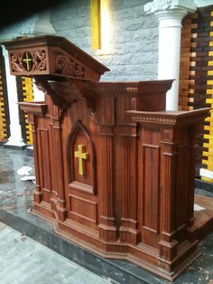 a wooden alter with a cross on it