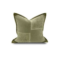 a green pillow on a white background