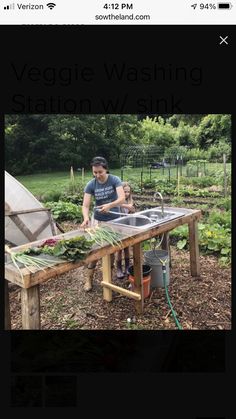 a man standing in front of a wooden table filled with plants and watermelon