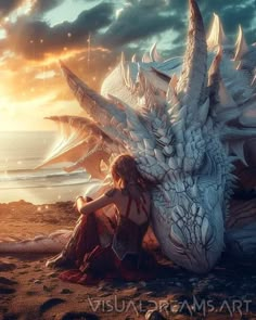 a woman sitting on the ground next to a large white dragon with its wings spread