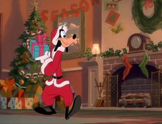 goofy dressed as santa clause running in front of christmas tree