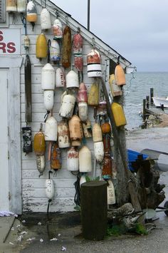 an old shack with various items hanging on it