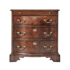 an antique chest of drawers with brass handles and knobs on the front, against a white background