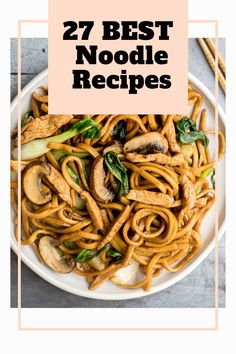 noodles with mushrooms and spinach in a white bowl on top of a gray table