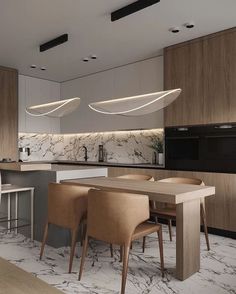 a modern kitchen and dining area with marble flooring, white walls and wooden cabinets