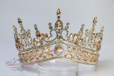 FAST SHIPPING One of a kind! Beautiful tiara with crystals in gold with honey stones. Perfect for any occasion. It has a loop at the end of each side to attach it in your hair with bobby pins for added security. Approx. 3.75" tall at its tallest point Ready to ship in 2-3 business days. Style DAC165G Crystal Tiara, Gold Tiara, Princess Jewelry, Tiara Wedding, Rhinestone Tiara, Princess Tiara, Tiara Crown, Crystal Tiaras