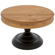 a round wooden table with black metal base and wood top on an isolated white background