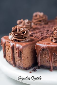 a cake with chocolate frosting on a white plate