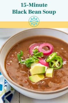 a white bowl filled with black bean soup