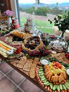 a table filled with lots of different types of food